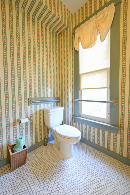 shows toilet with grab bars - a sample ADA adjacent bathroom in Gilmor Sloane House at Stony Point Center