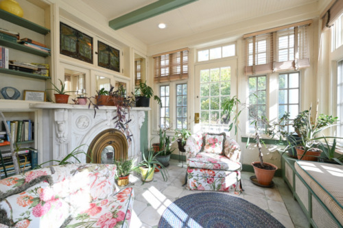 room flooded with light and plants - another spot for guests to use